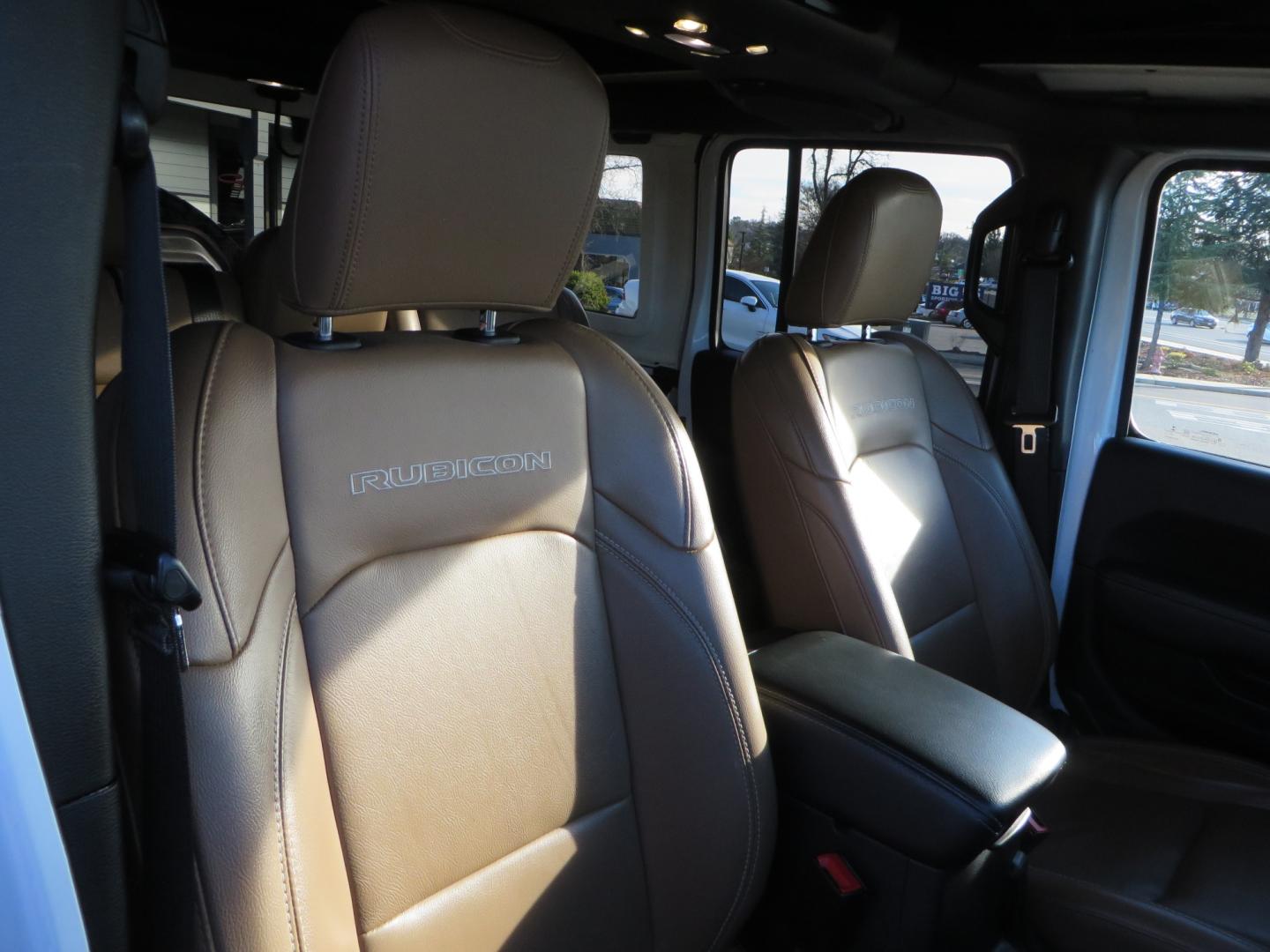 2020 White /TAN Jeep Wrangler Unlimited Rubicon (1C4HJXFG8LW) with an 3.6L V6 DOHC 24V FFV engine, 6A transmission, located at 2630 Grass Valley Highway, Auburn, CA, 95603, (530) 508-5100, 38.937893, -121.095482 - 3" Zone offroad suspension system, Fox adventure series shocks, rocksliders, Teraflex HD tire relocation, Mopar HD tailgate hinge, 17" KMC wheels, and 37" BFG KO2 tires. - Photo#49